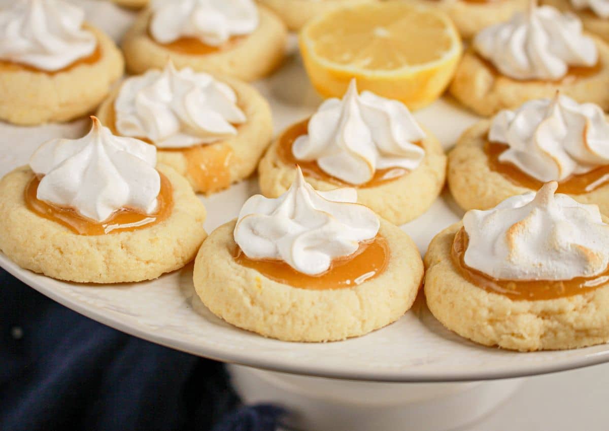 Lemon meringue cookies on a white plate.
