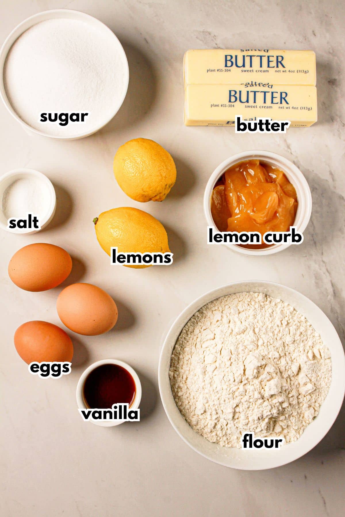 Bowls of ingredients on a counter labelled with text.