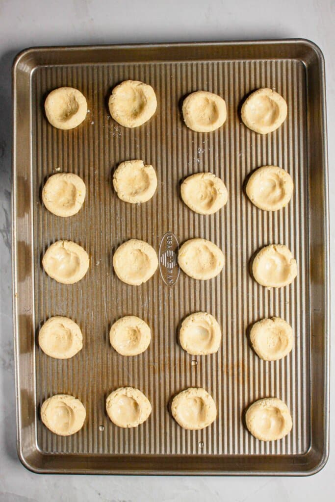 Cookie dough on a baking sheet.