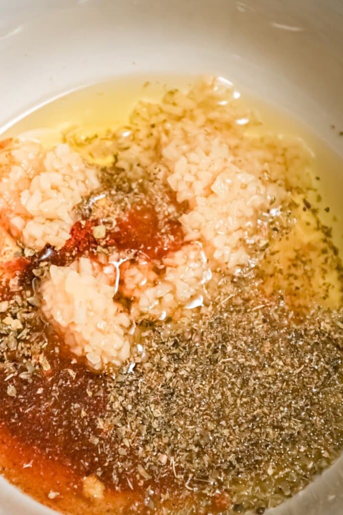 Marinade being mixed in a small bowl.