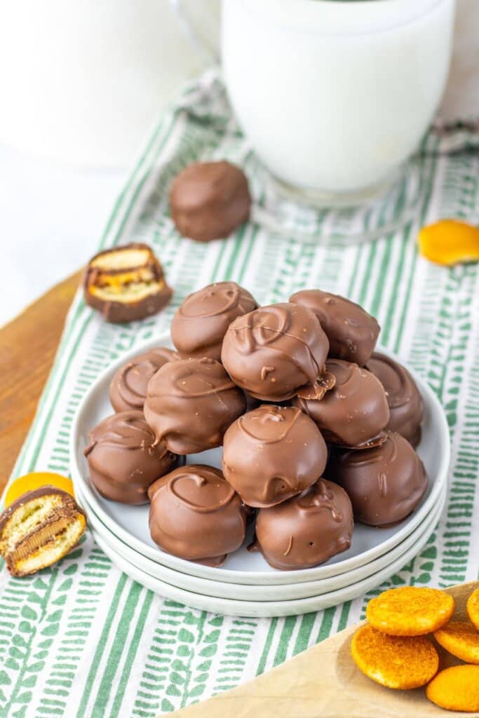 Small plates filled with Twix bites.