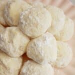 Plate full of cream cheese cookies.