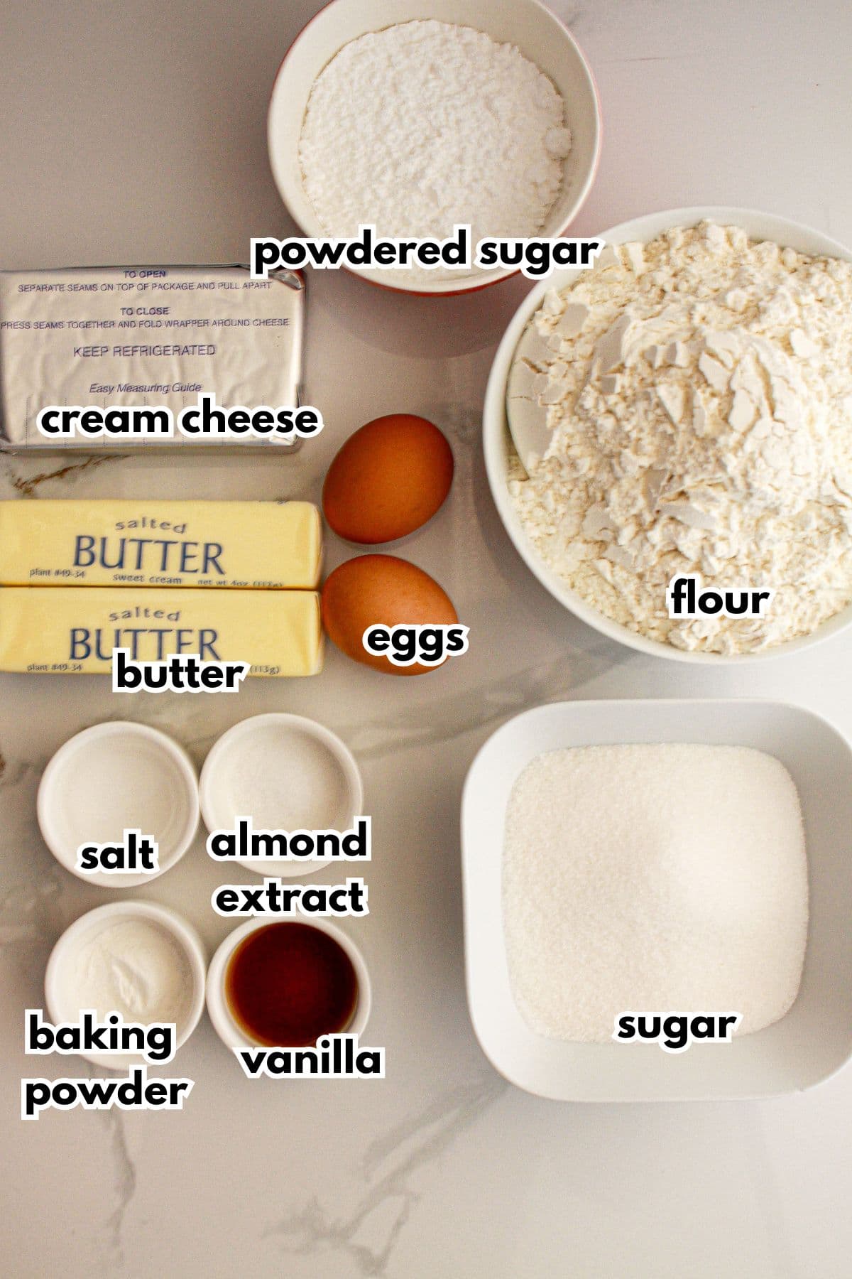 Bowls of ingredients on a counter labelled with text.