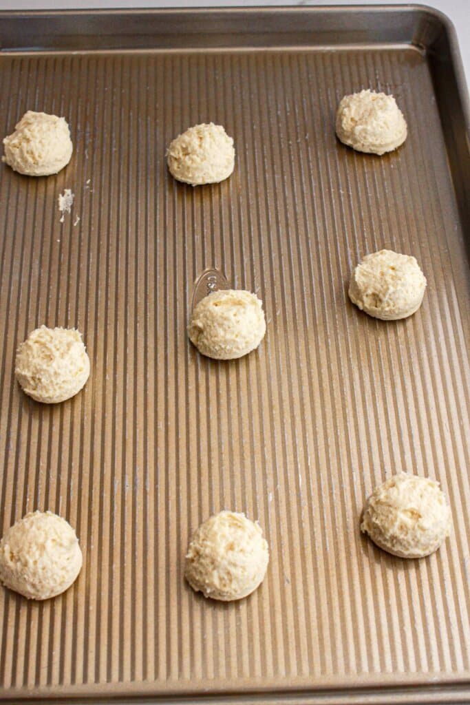 Dough balls on a baking sheet.