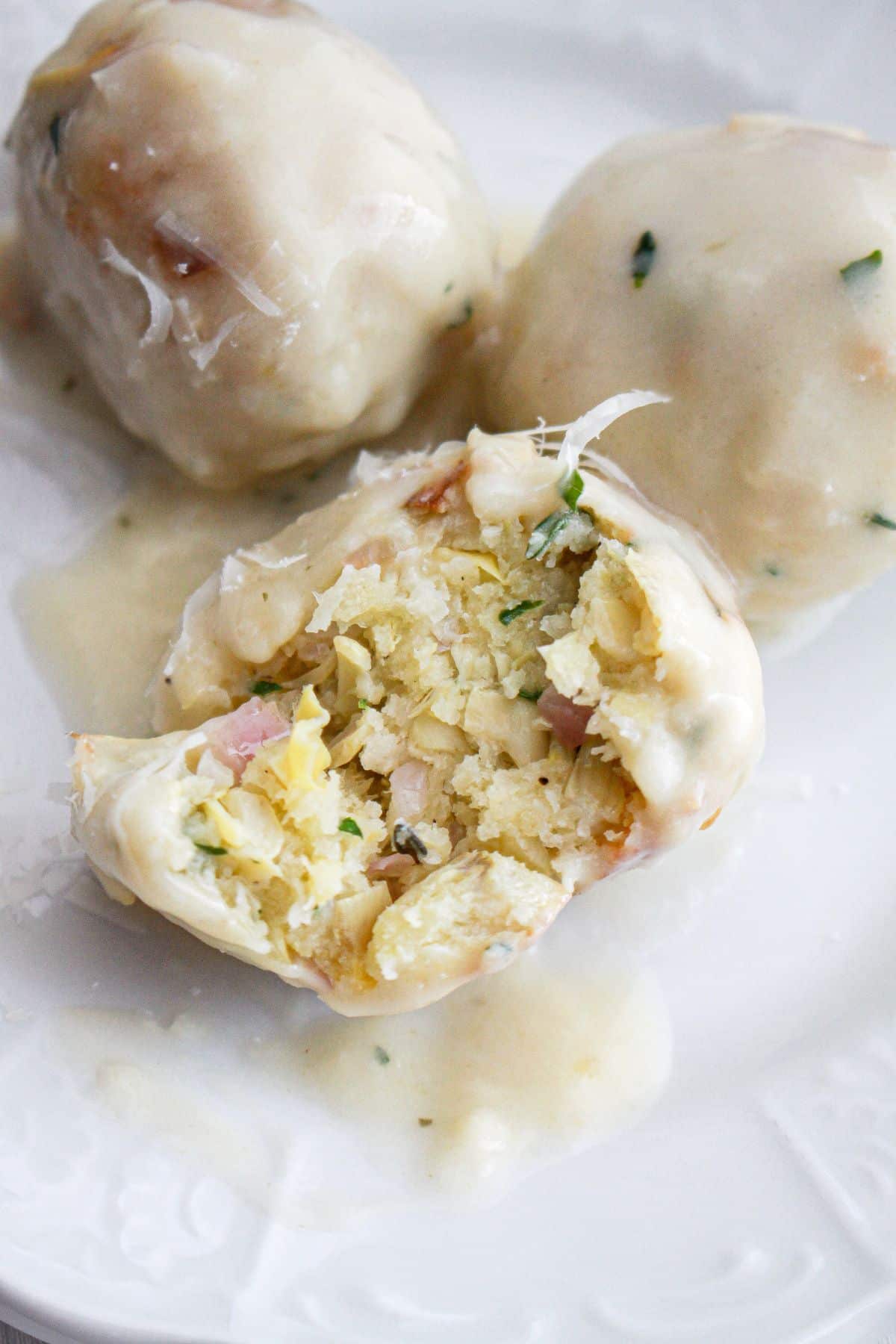 Artichokes meatballs on a plate.