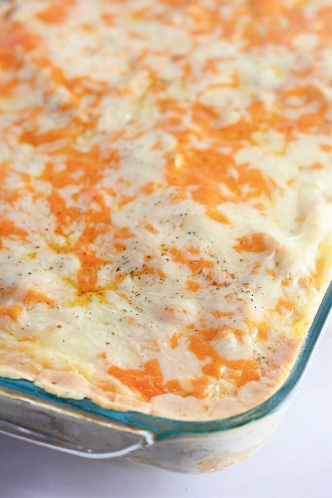 Glass casserole dish full of chicken tetrazzini.