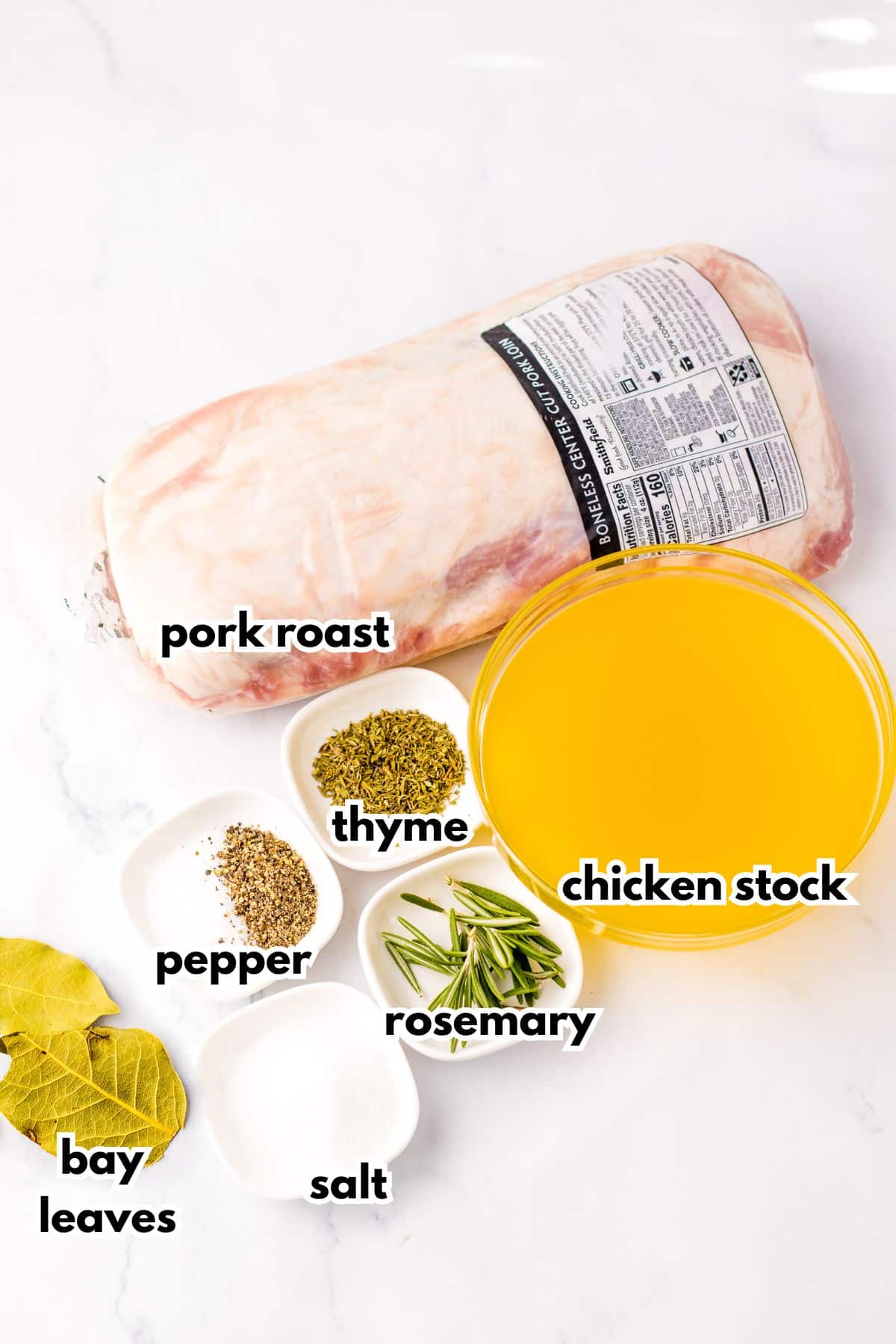 Ingredients labelled with text on a counter.