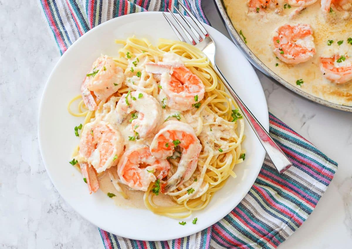 Plate full of creamy garlic shrimp.