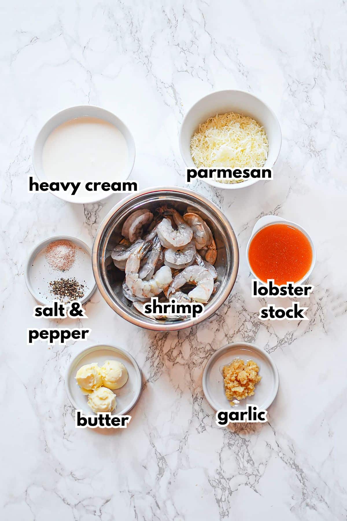 Ingredients in bowls on a counter labelled with text.