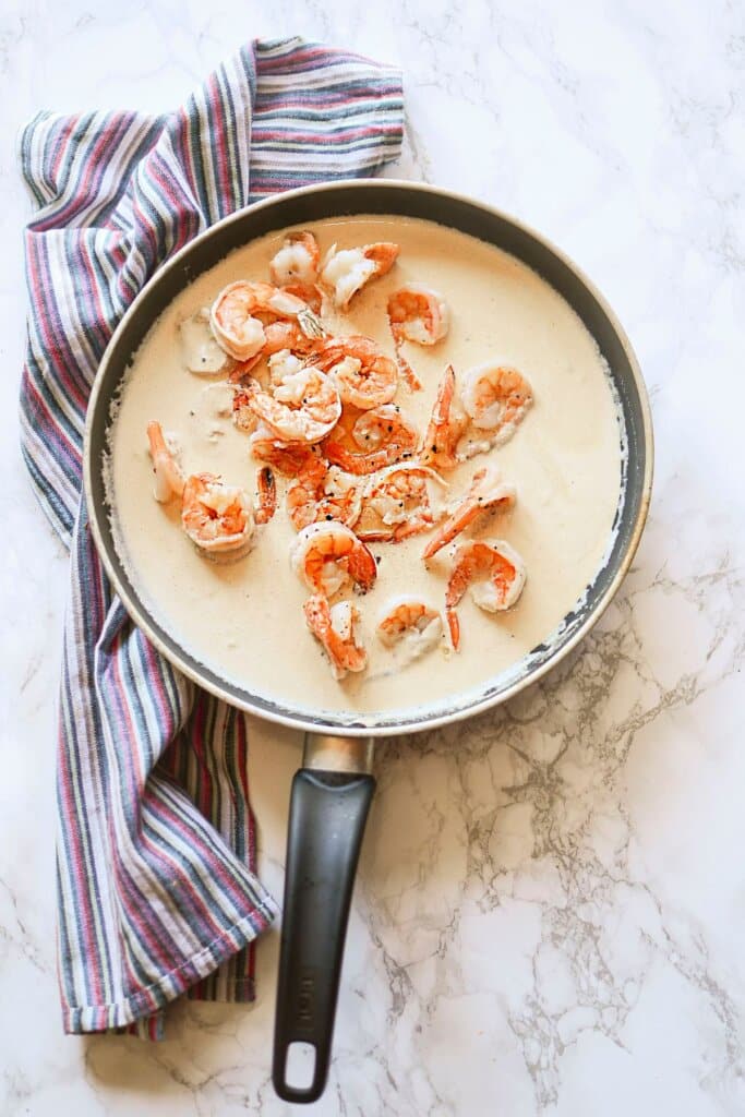 Cream sauce in a skillet.