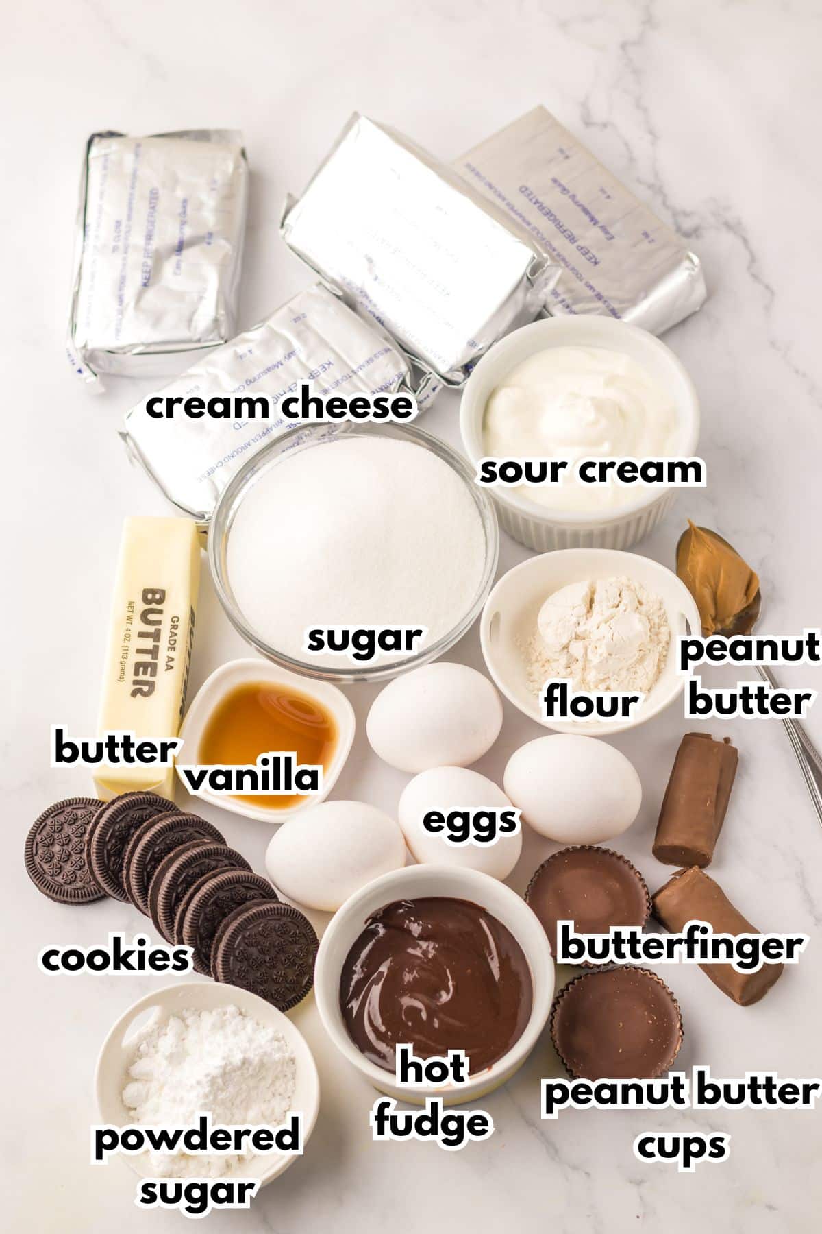 Bowls of ingredients labelled with text on a counter.