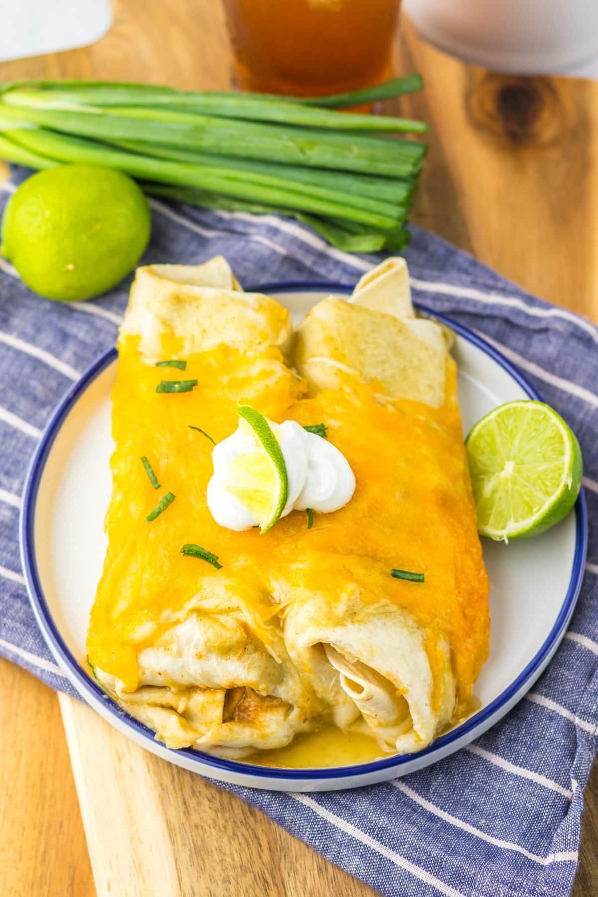 Two honey lime enchiladas on a plate.