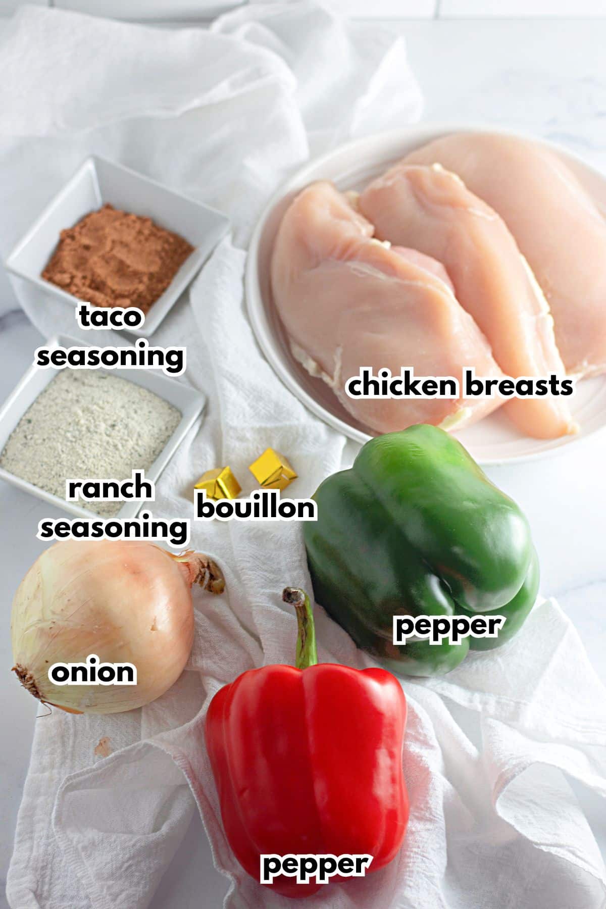 Ingredients labelled with text on a counter.