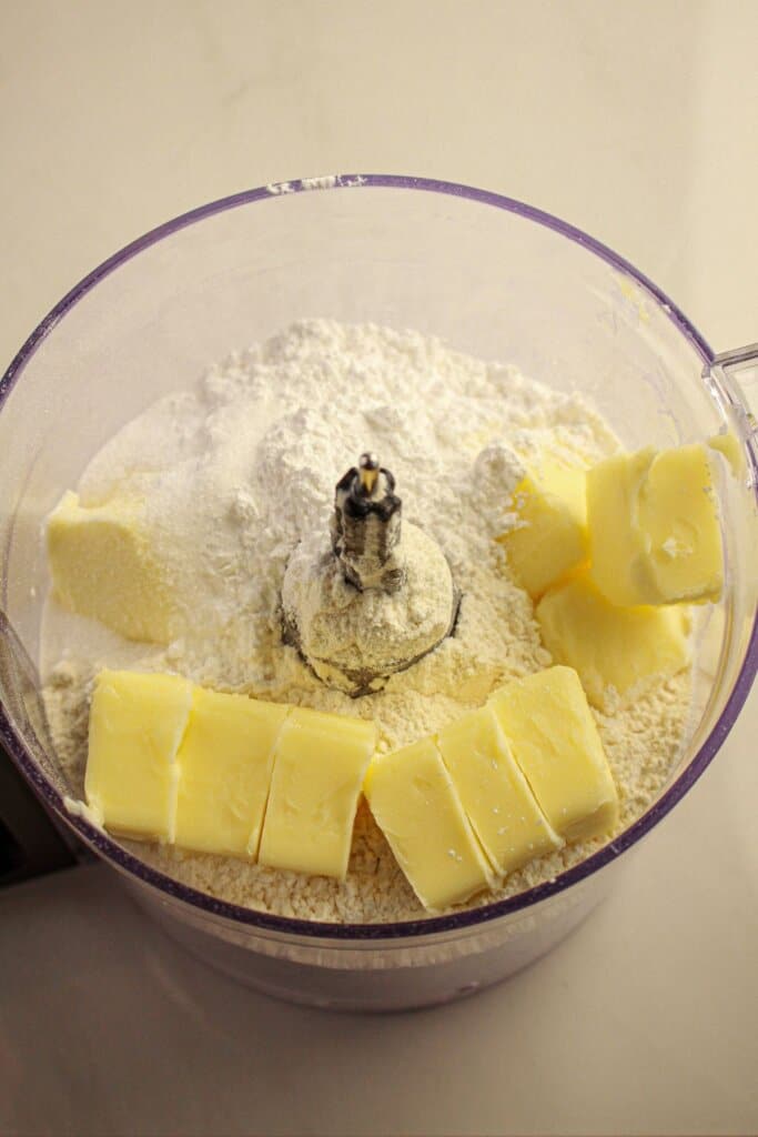 Butter and flour in a food processor.