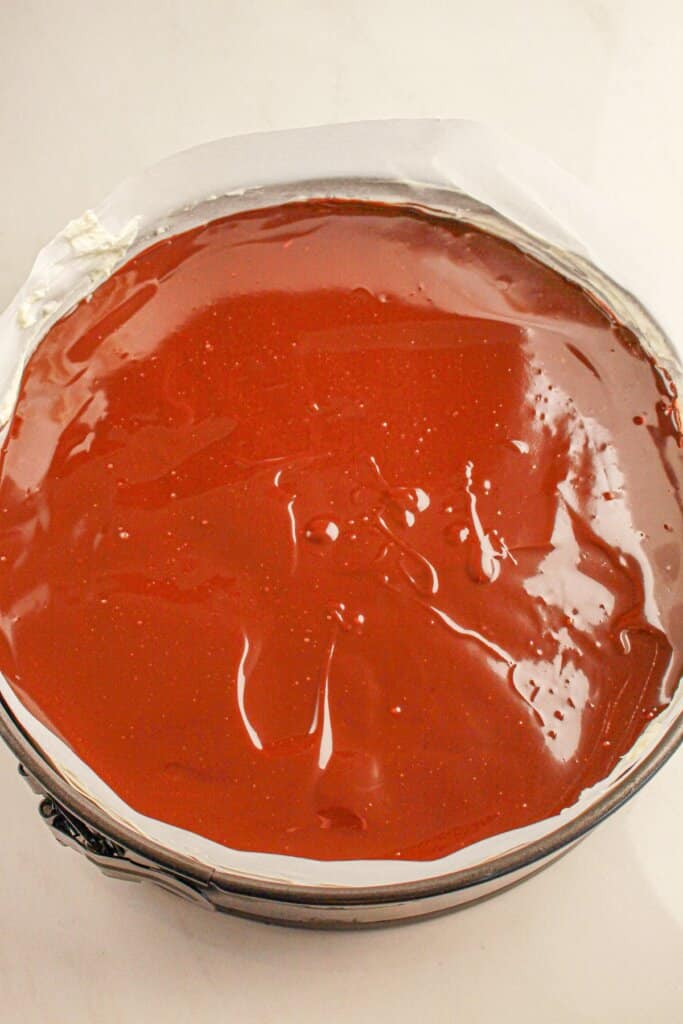 Chocolate ganache on top of no bake cheesecake.