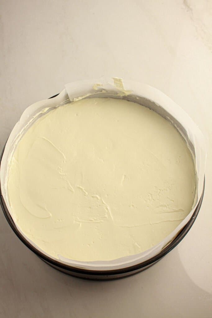 Cheesecake filling in a springform pan.