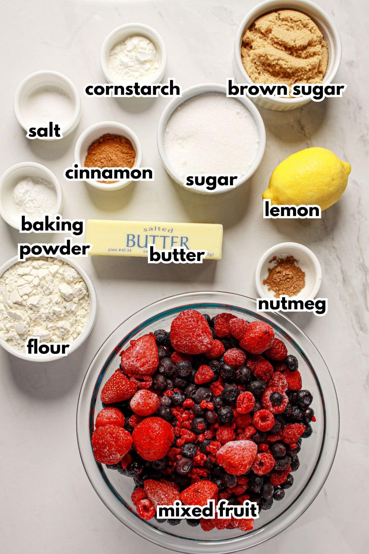 Bowls of ingredients on a counter labelled with text.