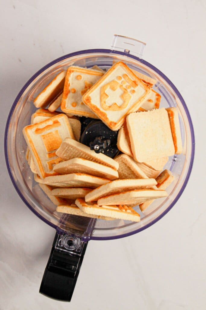 Chessman cookies in a food processor.