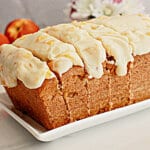 Peach bread slices on a square plate.