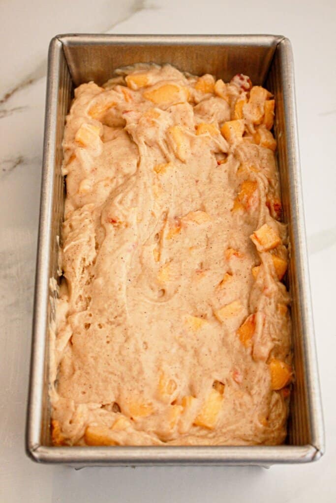 Batter in a loaf pan.