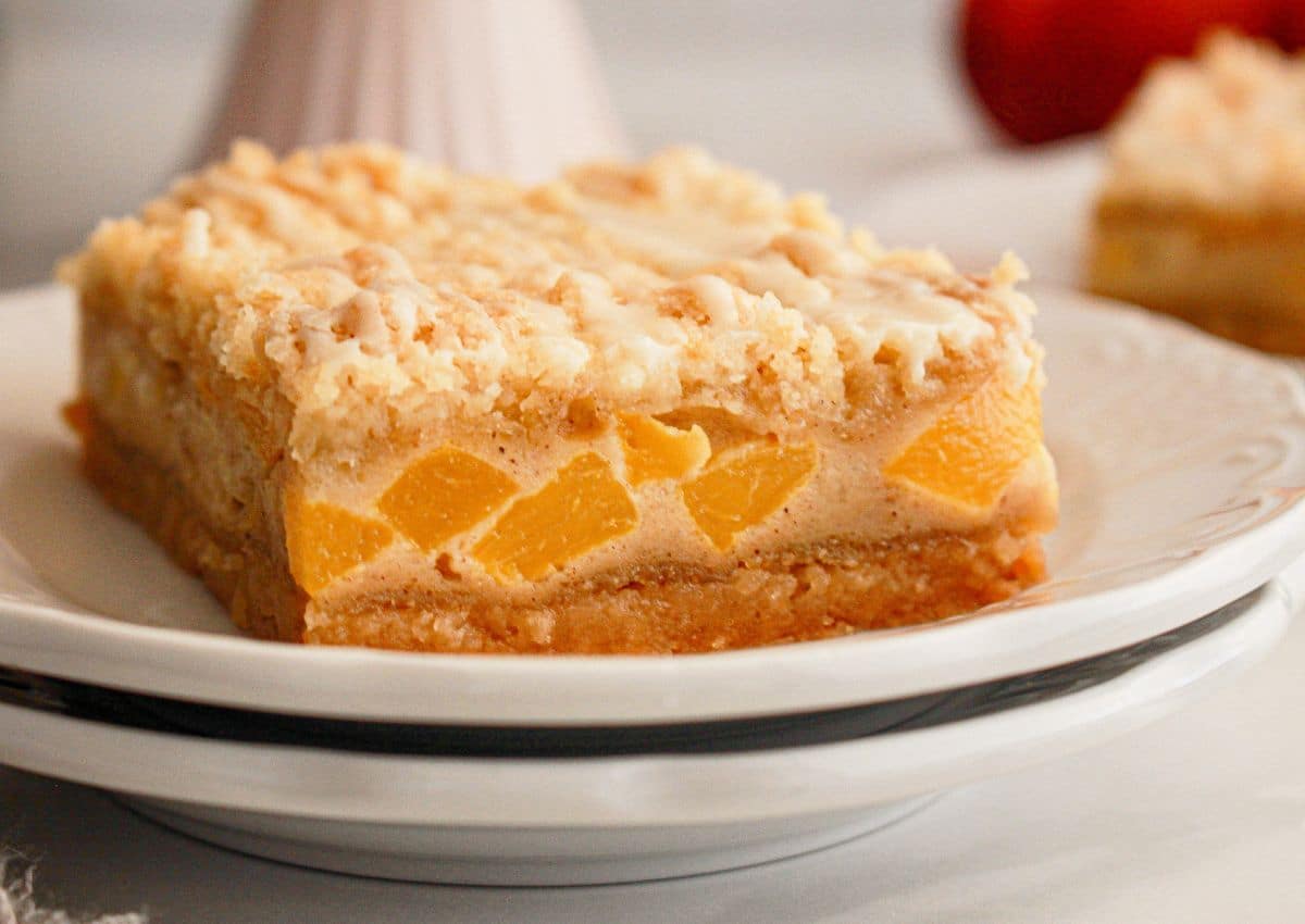 Peach pie bar on a plate.