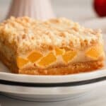 Peach pie bar on a plate.