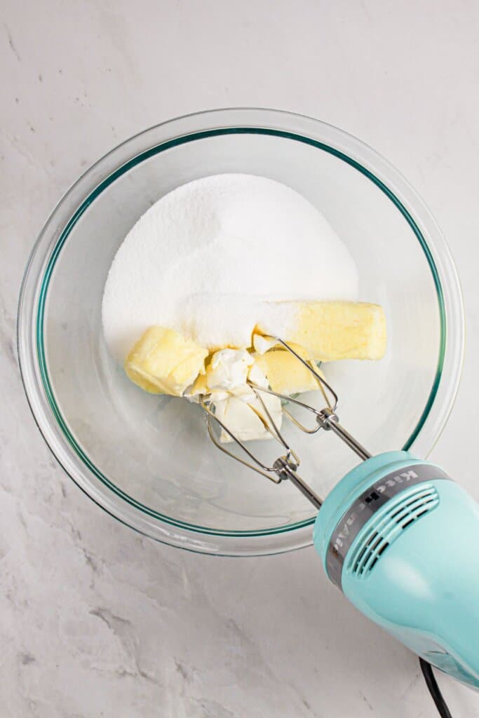 Butter and sugar being creamed together.