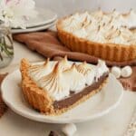 Slice of smores tart on a plate.