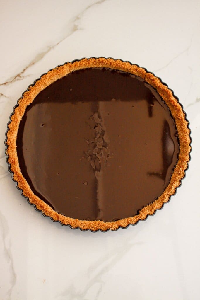 Chocolate ganache in a pie plate.