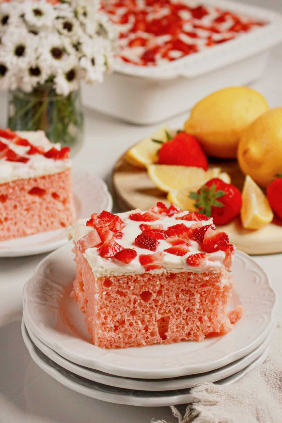 Slice of cake on a small white plate.