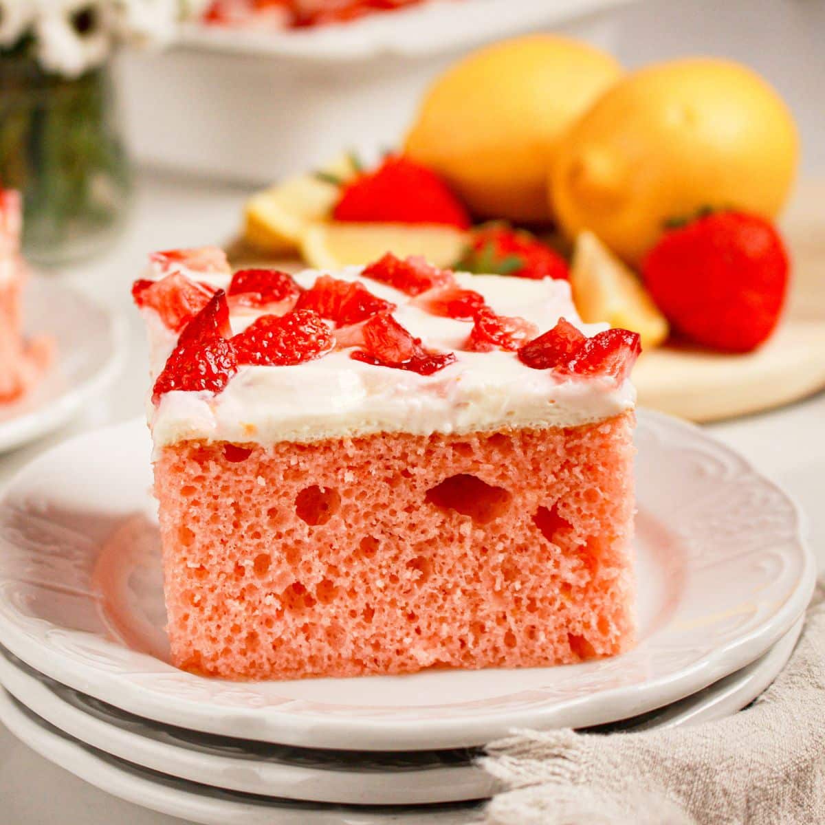 Slice of cake on a small white plate.