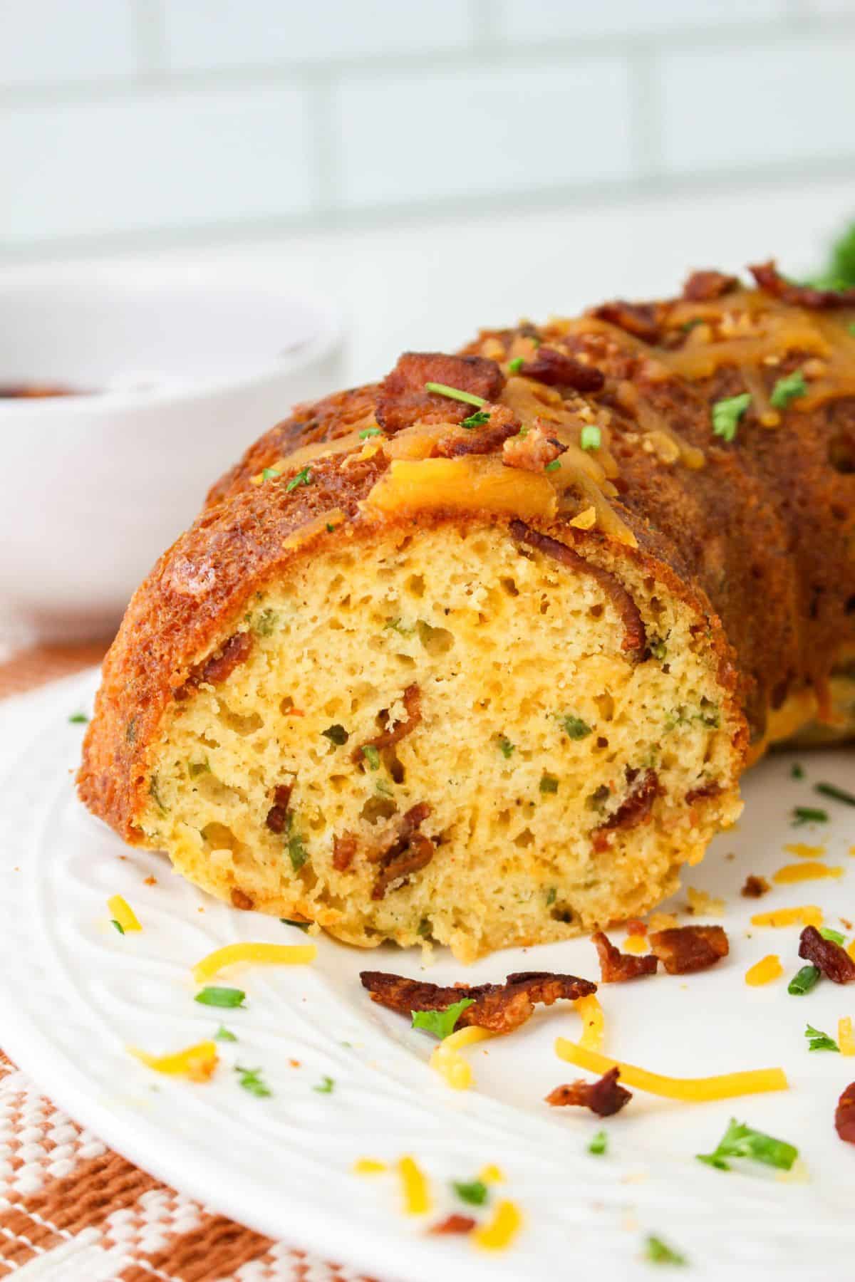 Slice of bundt cake breakfast on a small plate.