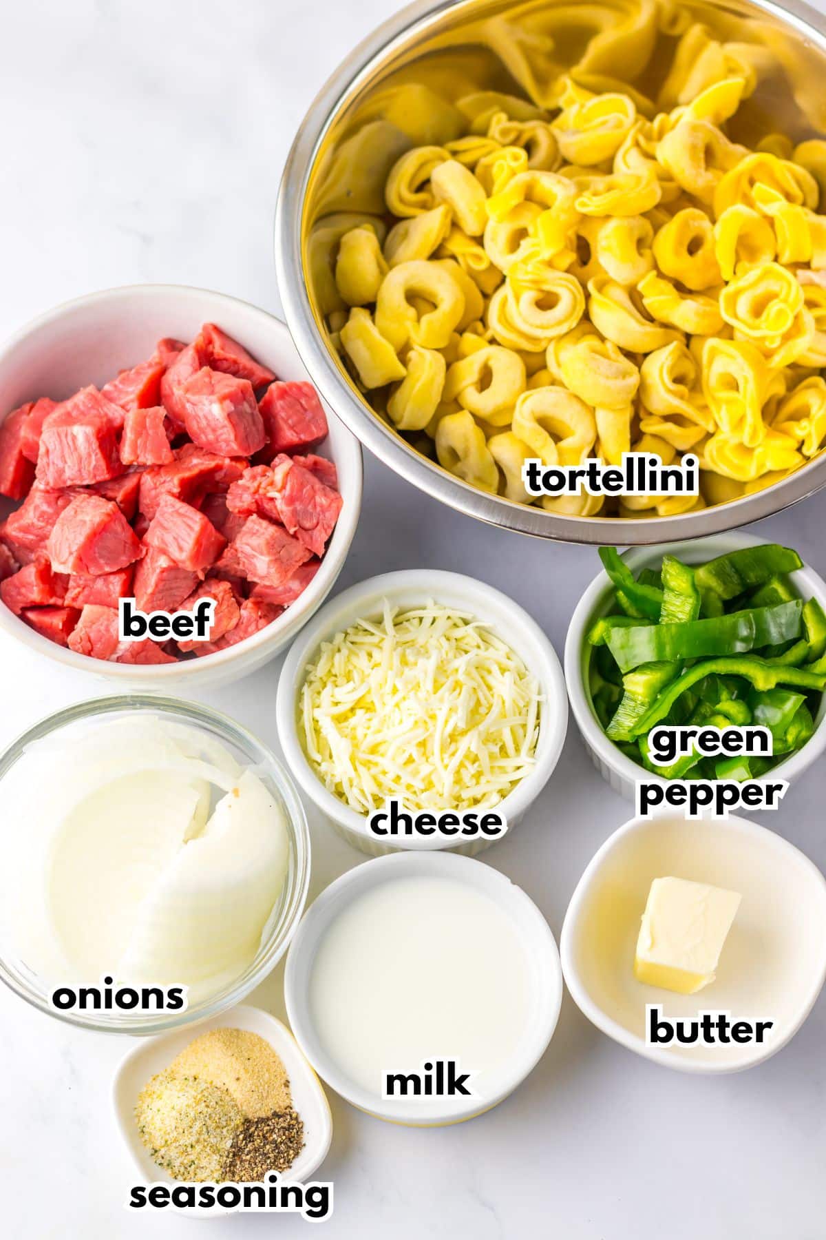 Bowls of ingredients labelled with text ready to cook.