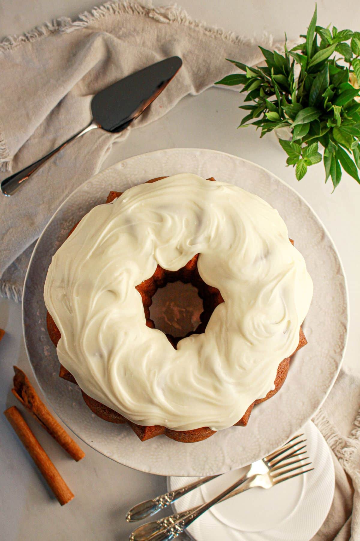 Cinnamon roll bundt cake on a plate.