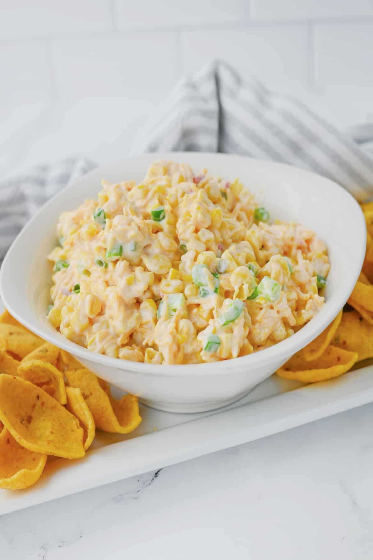 White bowl full of crack corn dip.