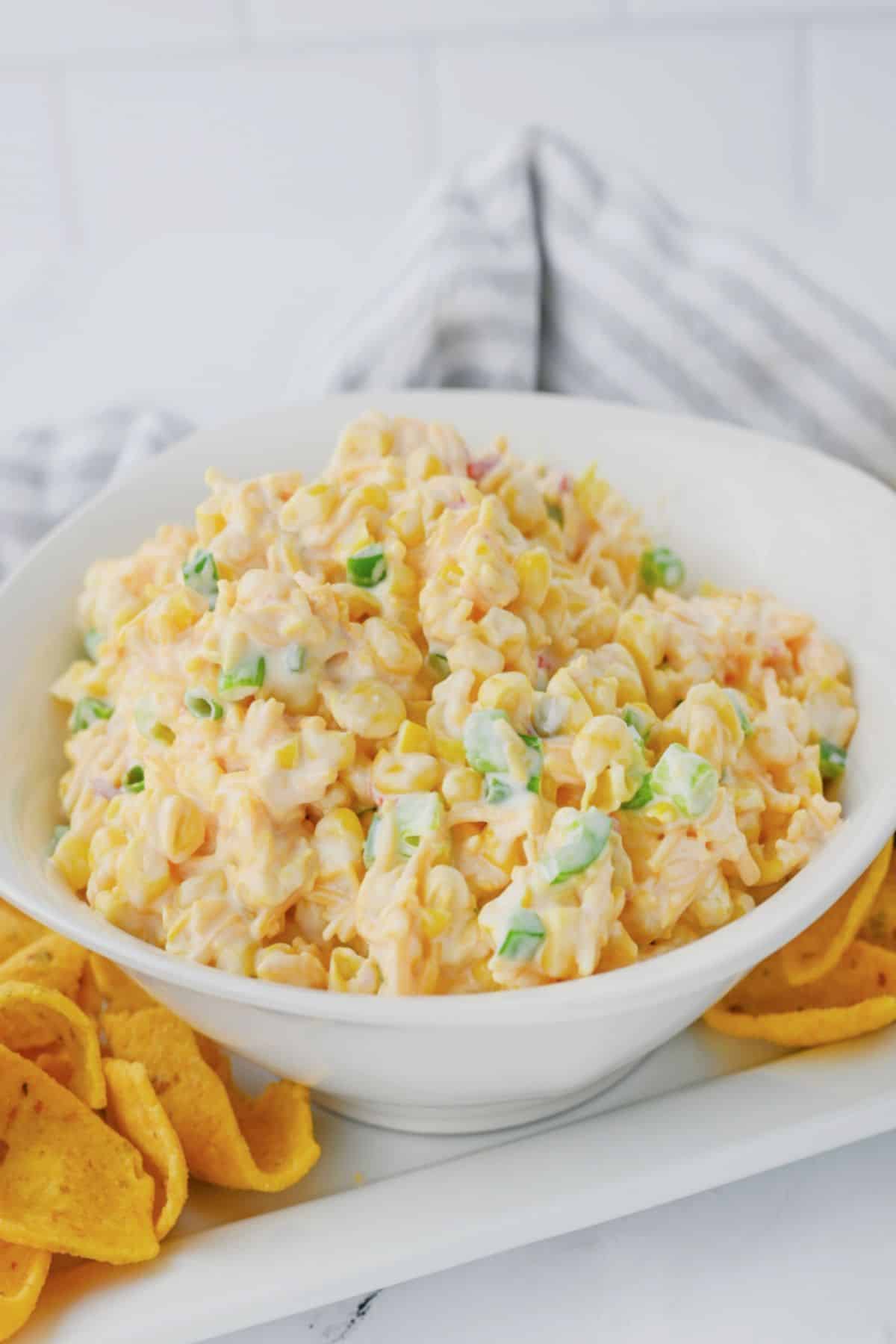 White bowl full of crack corn dip.