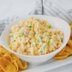 White bowl full of crack corn dip.