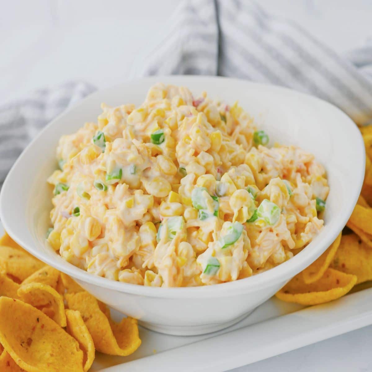 White bowl full of crack corn dip.