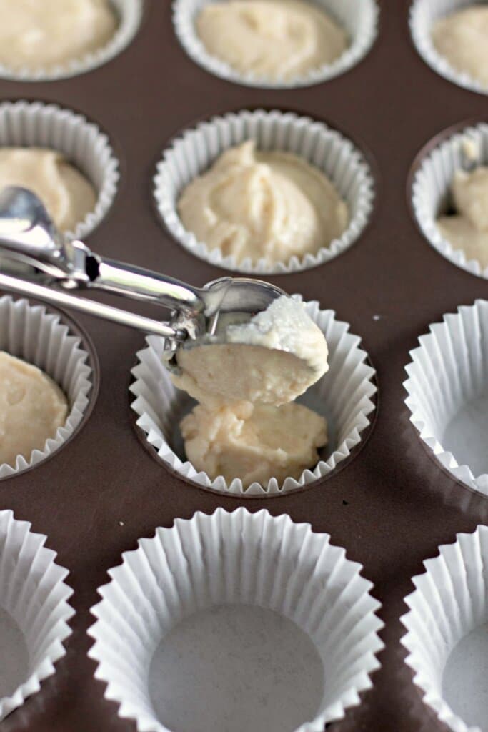 Butter in a muffin pan.