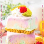 Two rainbow sherbet bars stacked on top of each other.