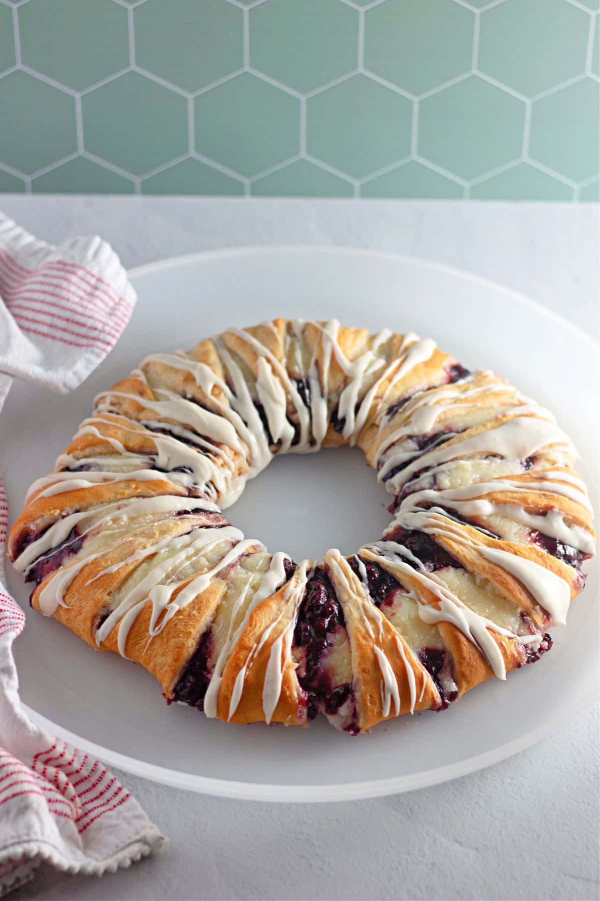 Berry crescent ring on a white serving platter.