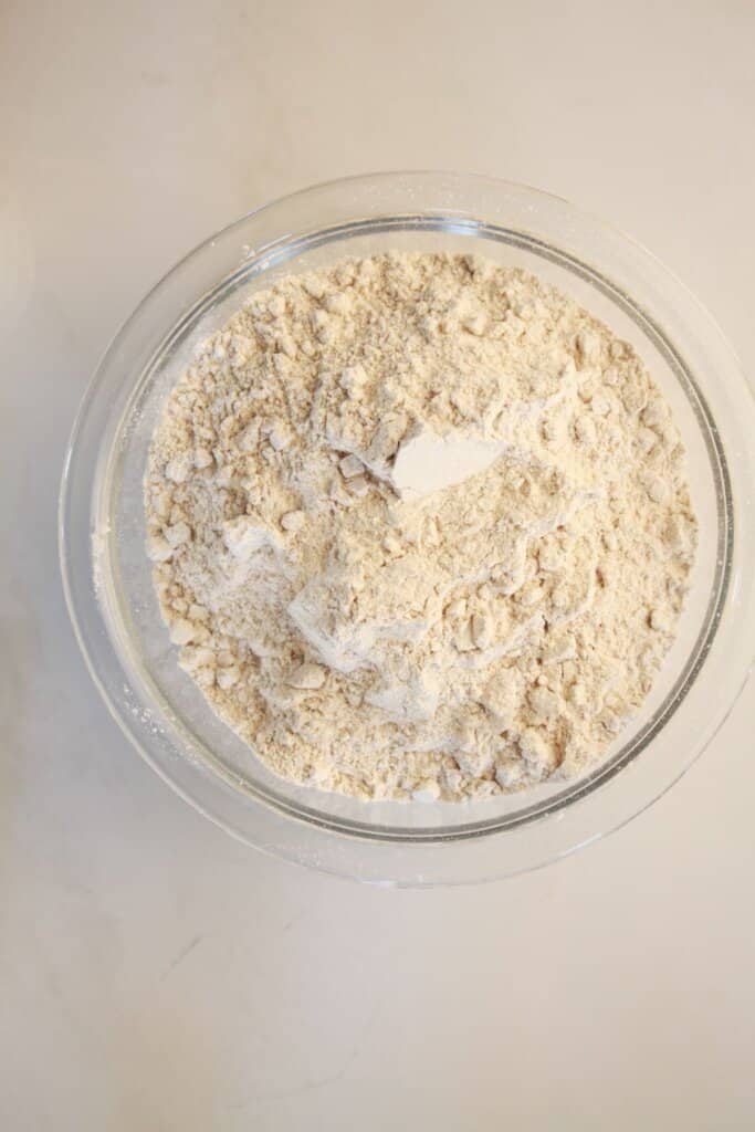 Dry ingredients in a glass mixing bowl.