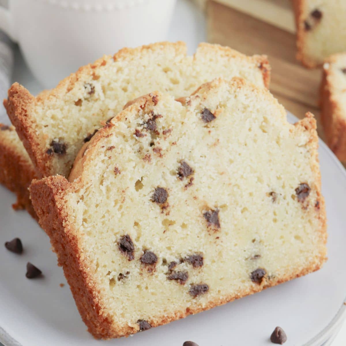 Slices of chocolate chip pound cake on a plate.