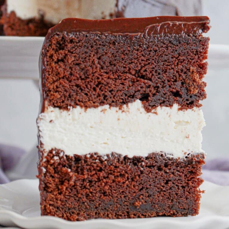 Slice of ding dong cake on a small plate.