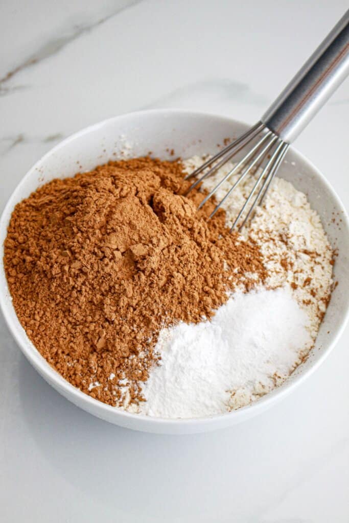 Dry ingredients being mixed in a medium bowl.