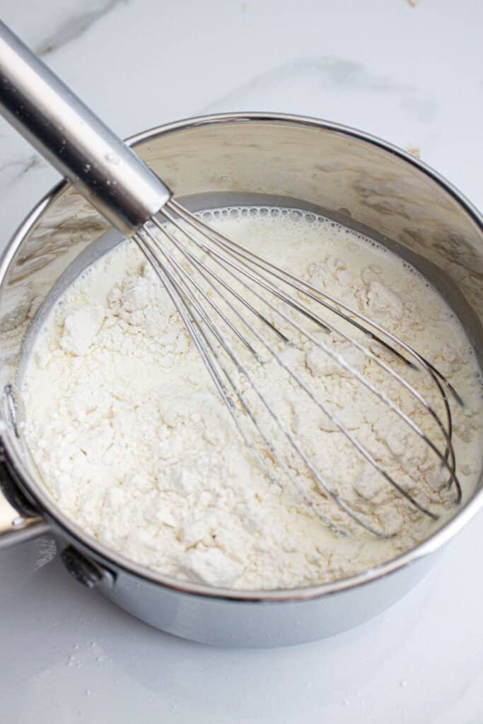 Filling being cooked in a saucepan.