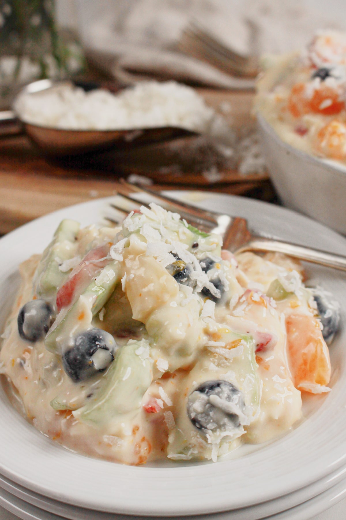 White bowl full of Hawaiian Cheesecake Salad.