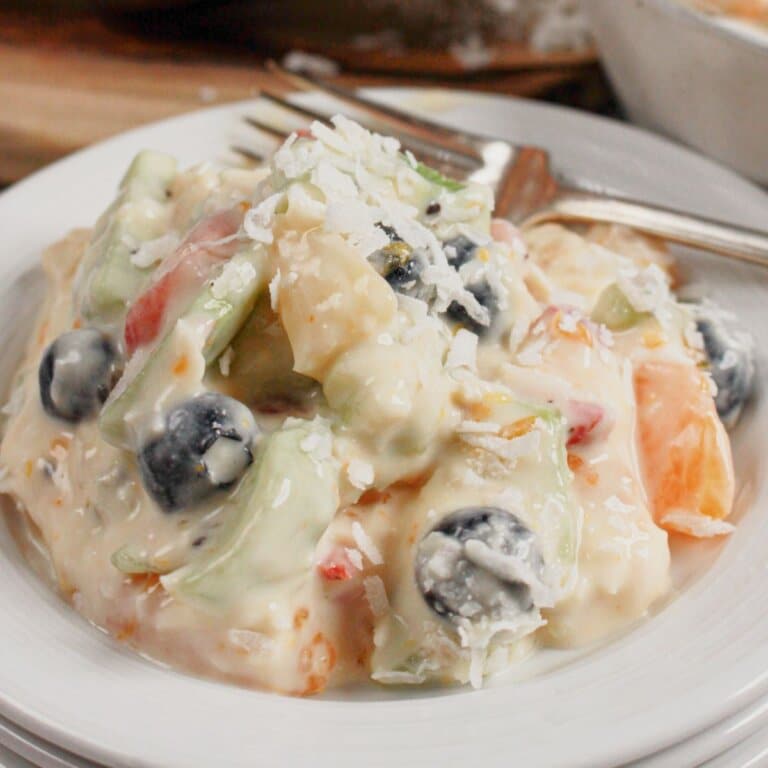 White bowl full of Hawaiian Cheesecake Salad.