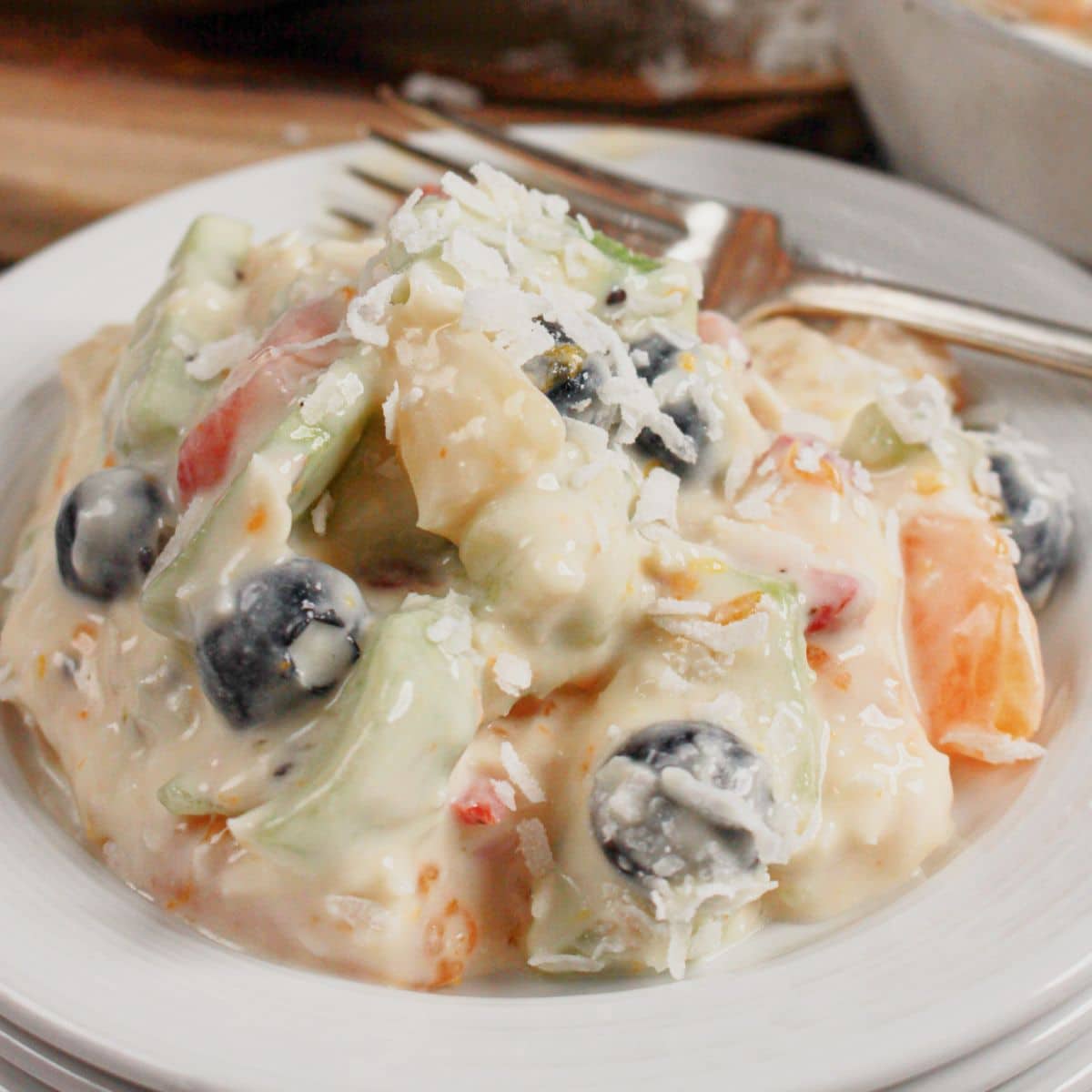 White bowl full of Hawaiian Cheesecake Salad.