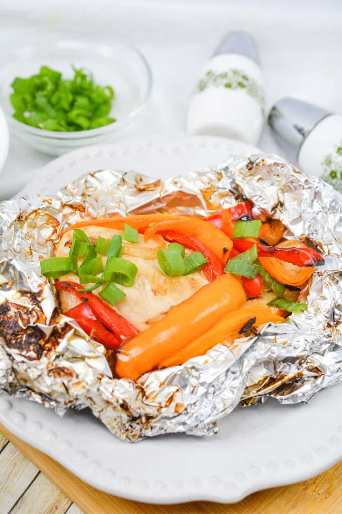Hawaiian chicken packet on a plate.